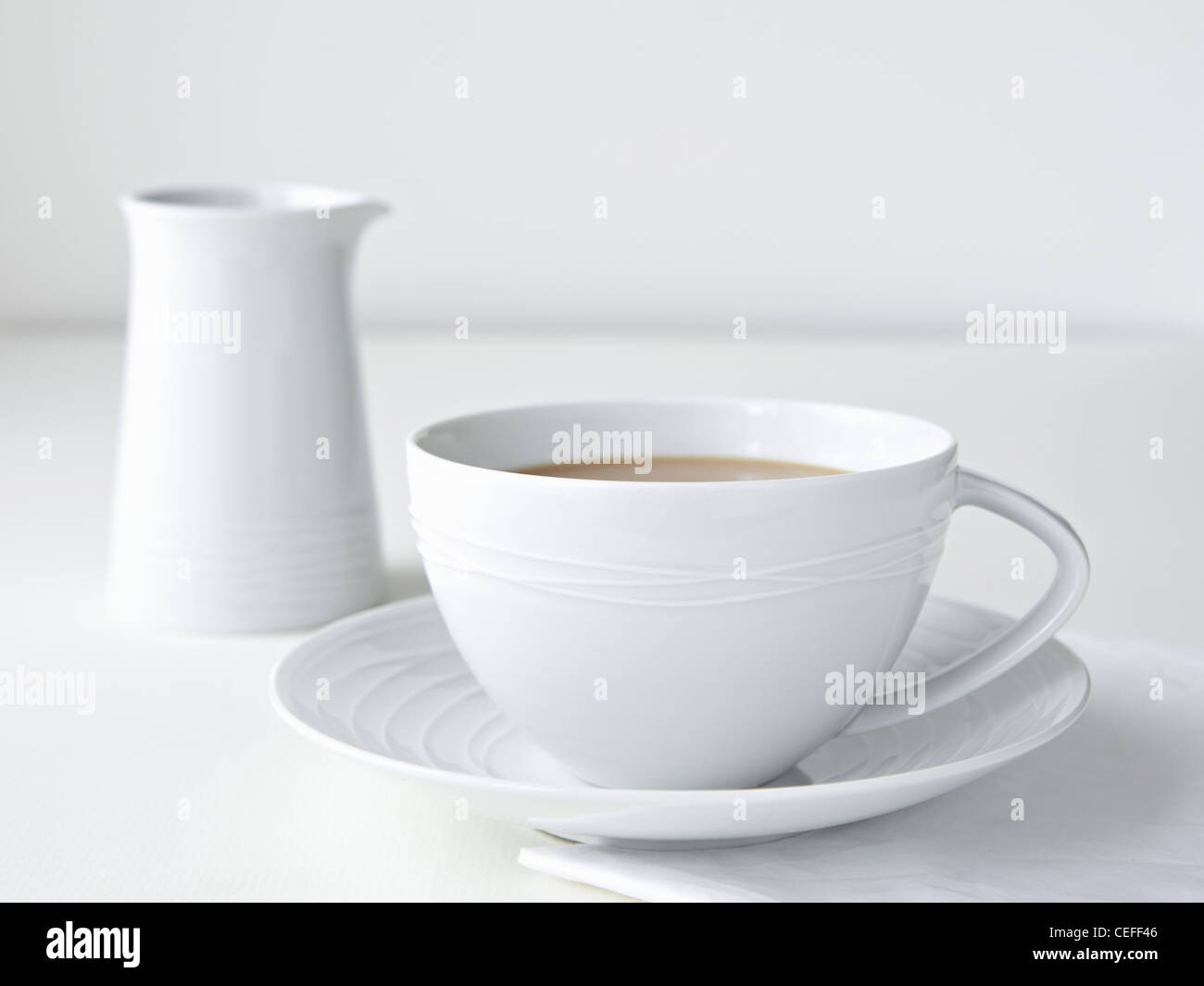 Cup of tea with milk Stock Photo