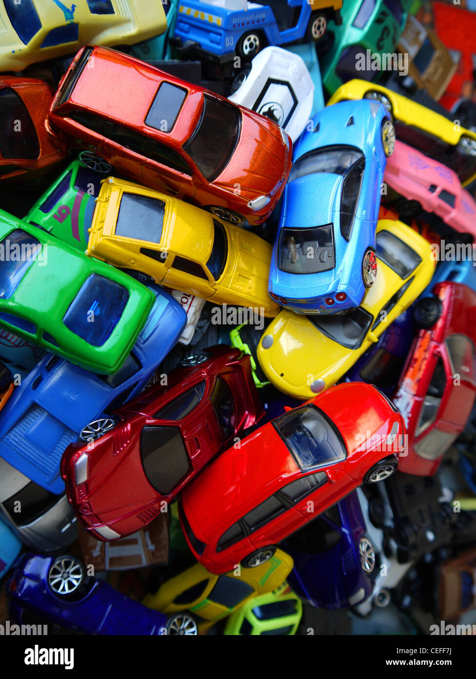 lots of toy cars in a pile Stock Photo