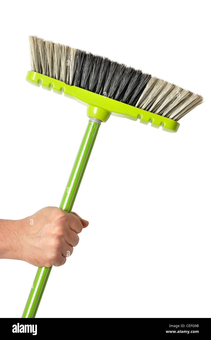 Hand with Green Broom Stock Photo