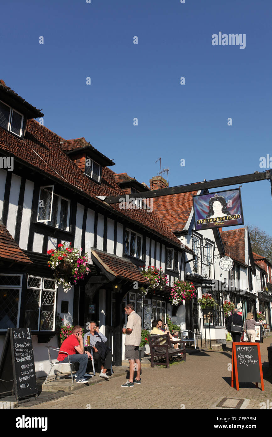 A view of The Queens Head Pub and Pinner High Street, Middlesex, London