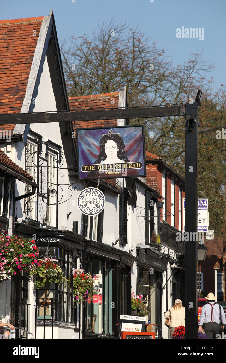 A view of The Queens Head Pub and Pinner High Street, Middlesex, London UK Stock Photo