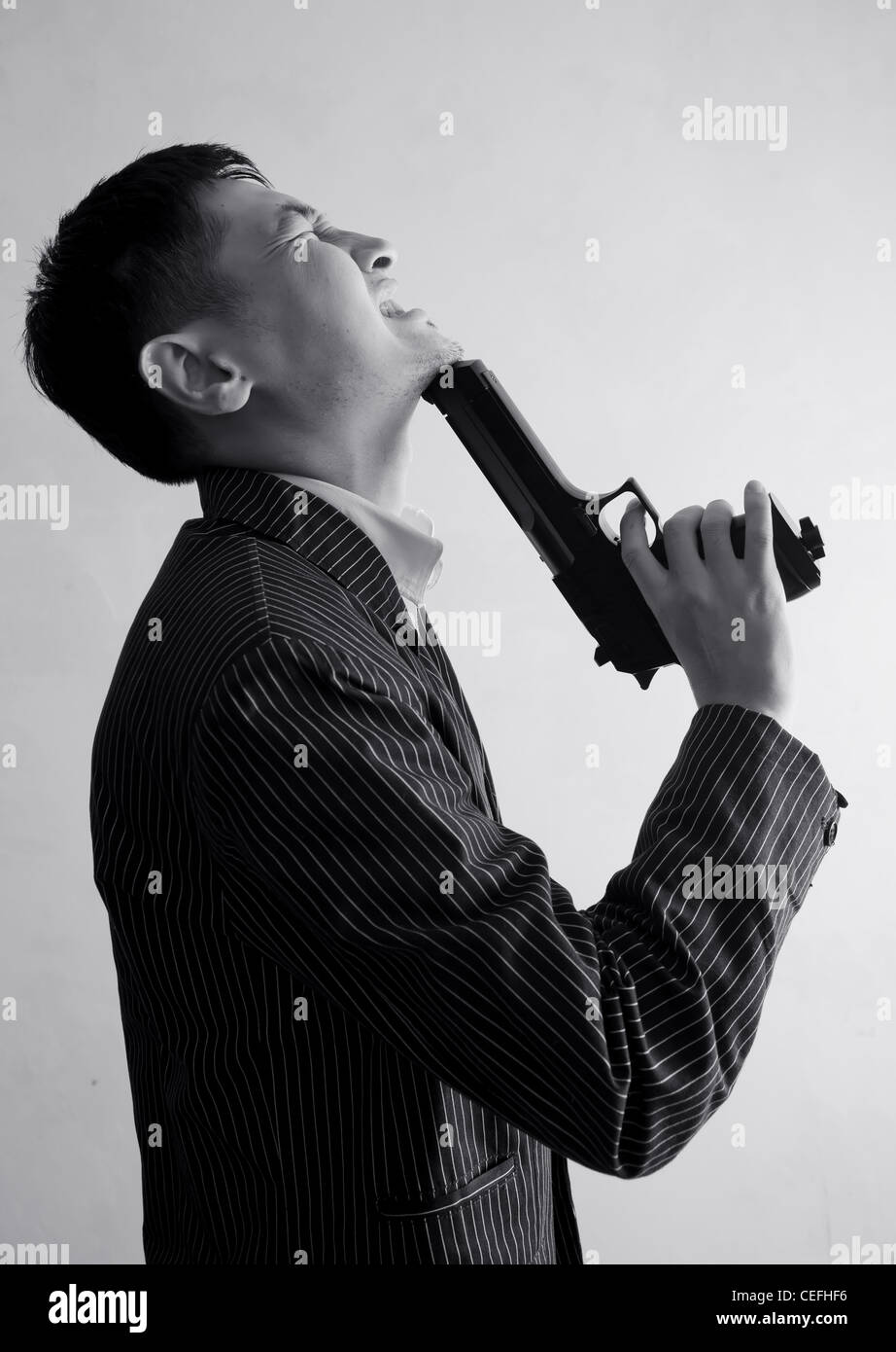 Pistol at chin hires stock photography and images Alamy
