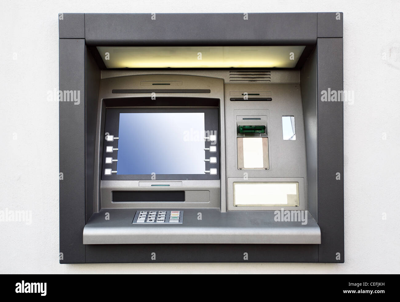 Automated teller machine close up on a wall Stock Photo
