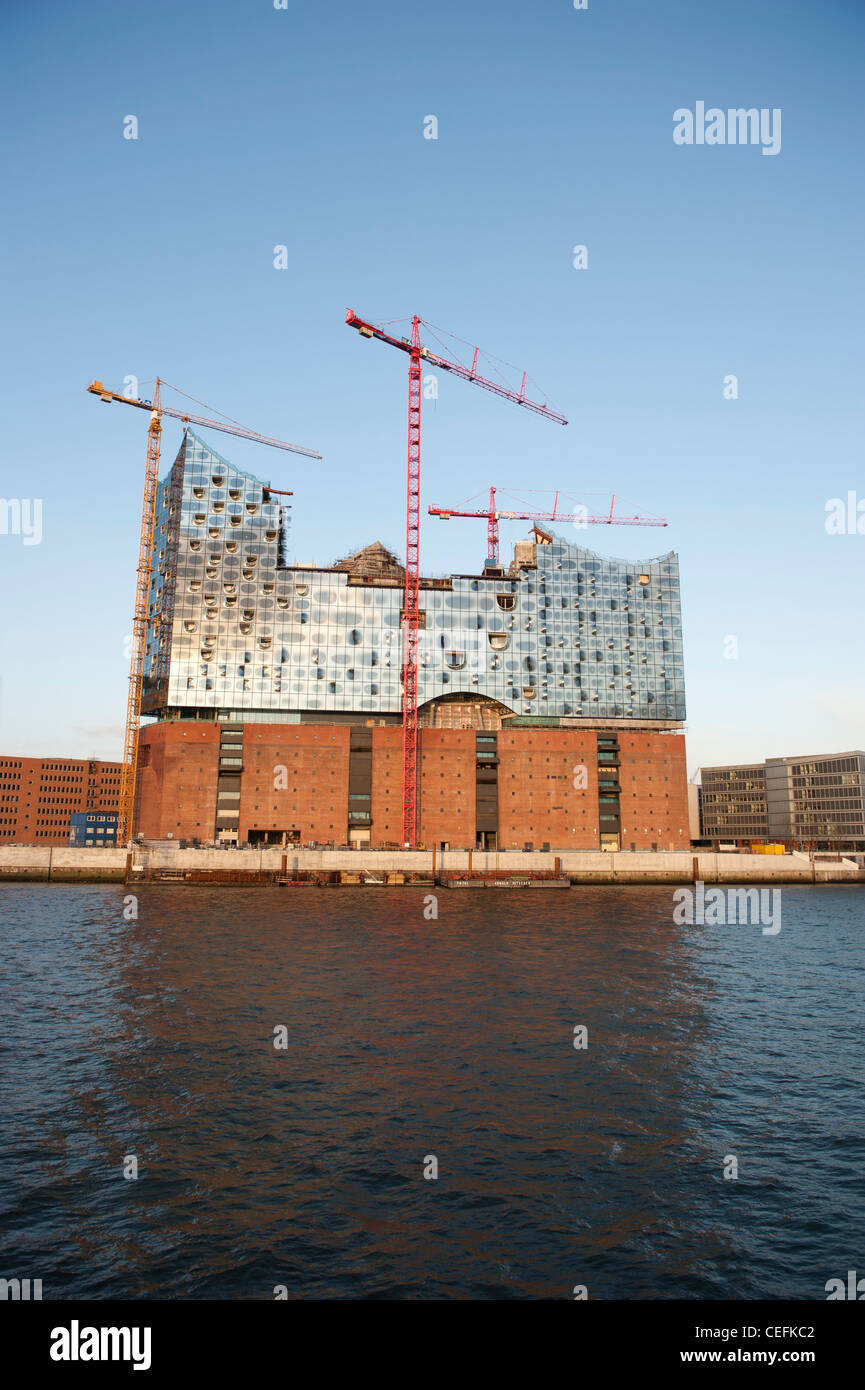 Elbphilharmonie, Hamburg's new landmark concert hall, is being erected on a former port warehouse with a shining glass facade Stock Photo