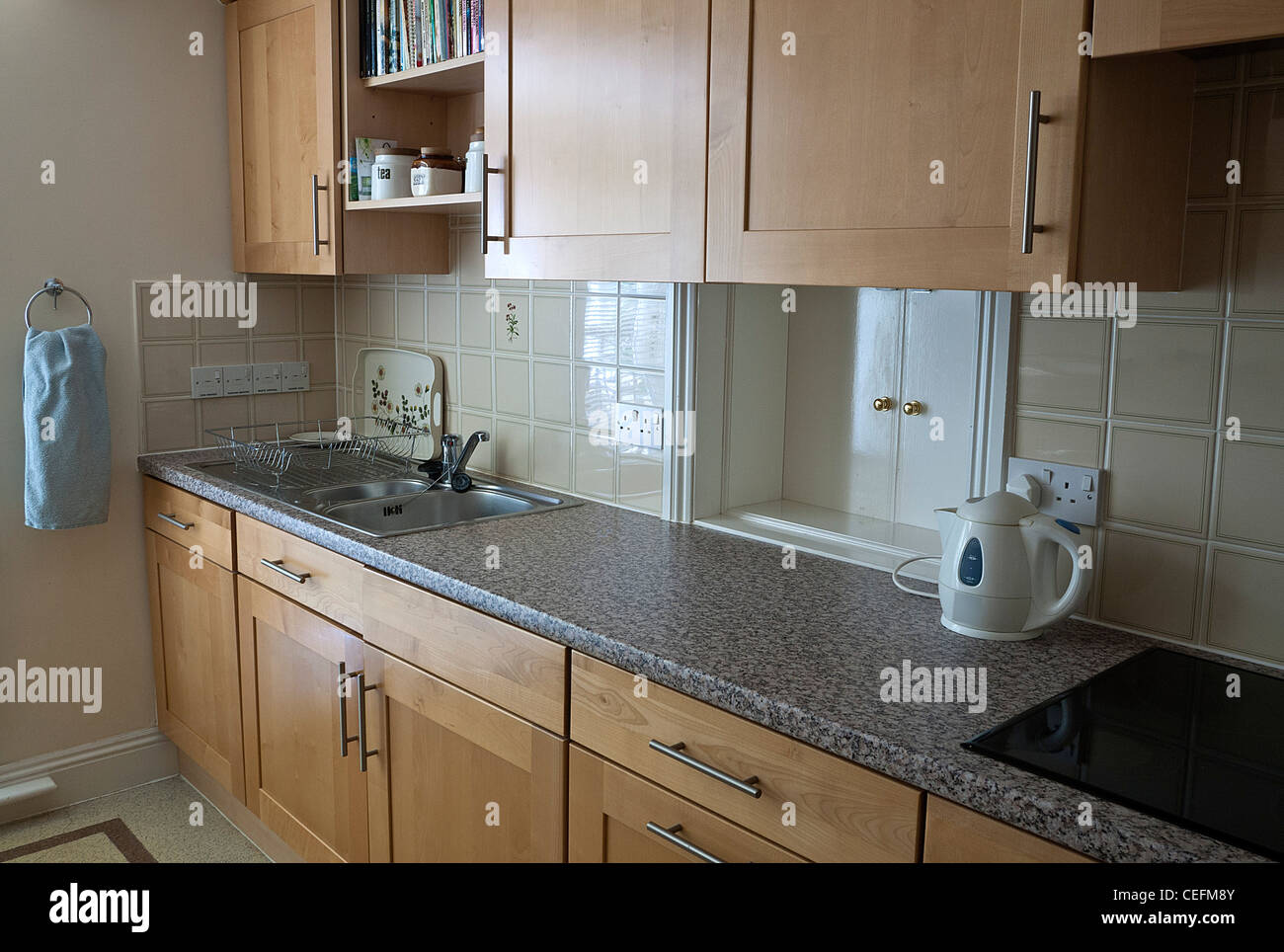 Modern Kitchen interior with Fitted storage cabinets, UK Stock Photo
