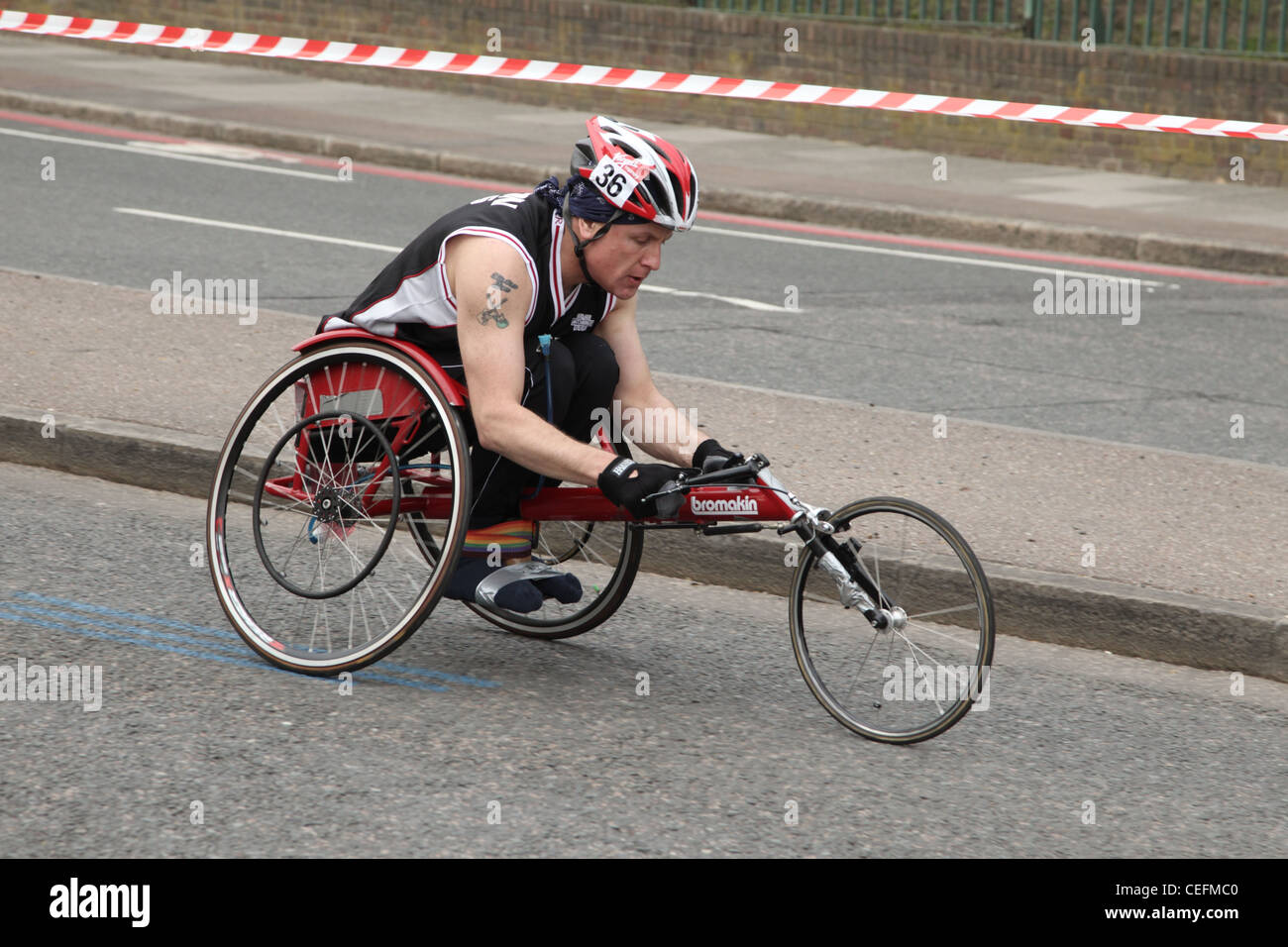 Wheelchair racer in the 2011 Virgin London Marathon Stock Photo