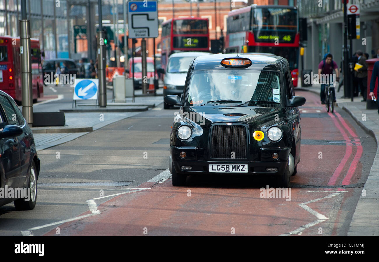 London red bus black taxi hi-res stock photography and images - Alamy