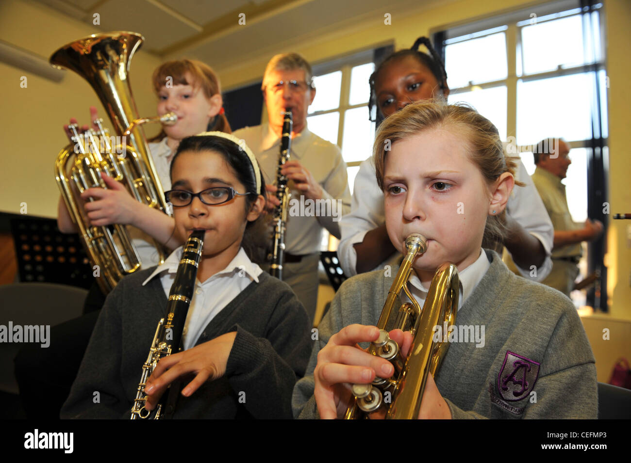children play in a school orchestra Stock Photo