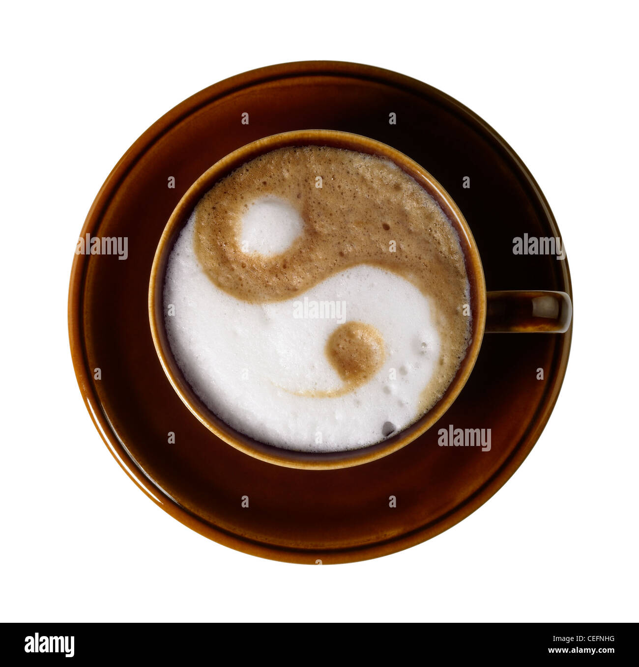 cup of coffee with marbled milk froth, isolated on white with clipping path, seen from above Stock Photo