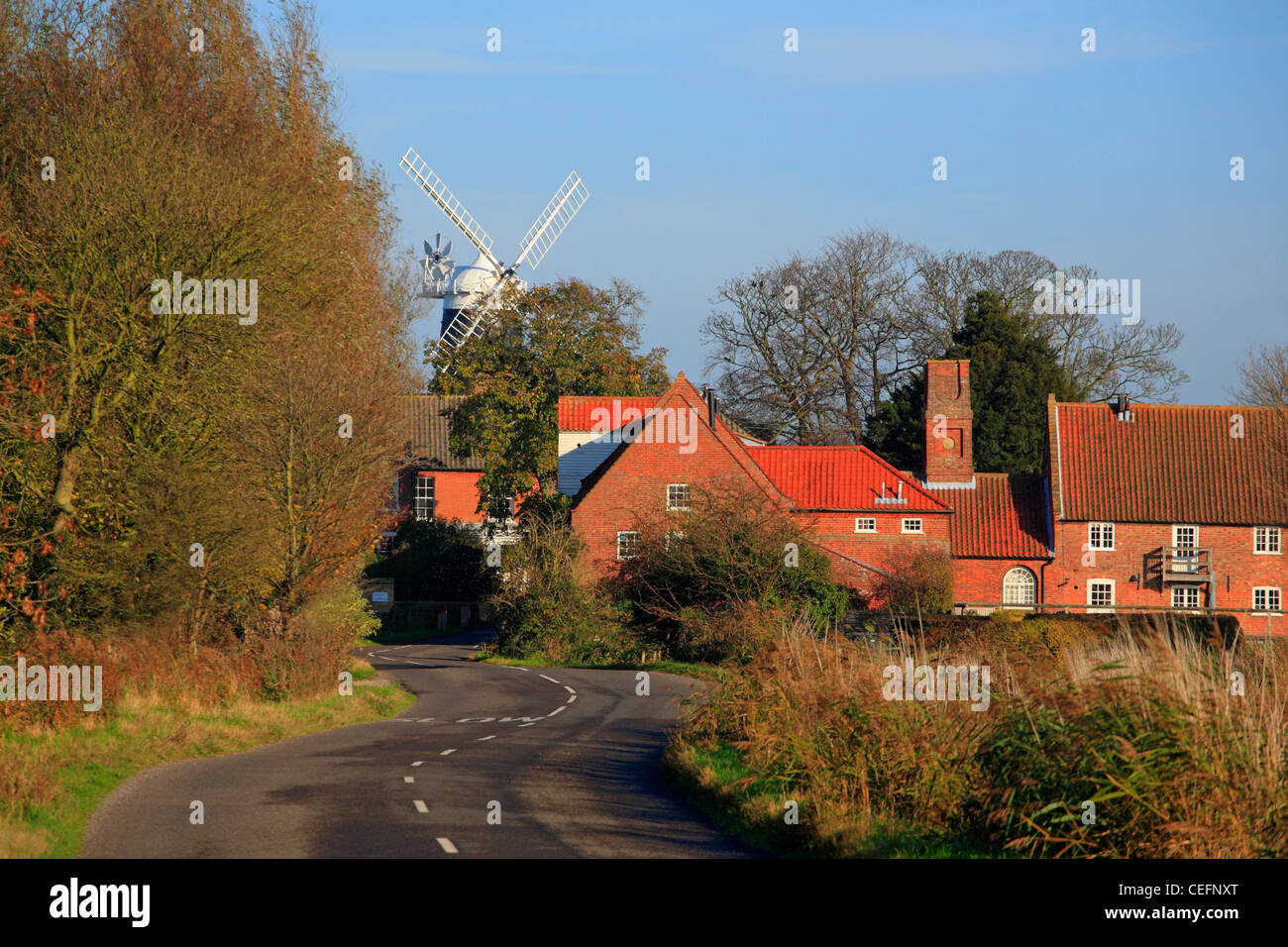 The watermill at Burnham Overy with Tower Mill windmill behind. Stock Photo