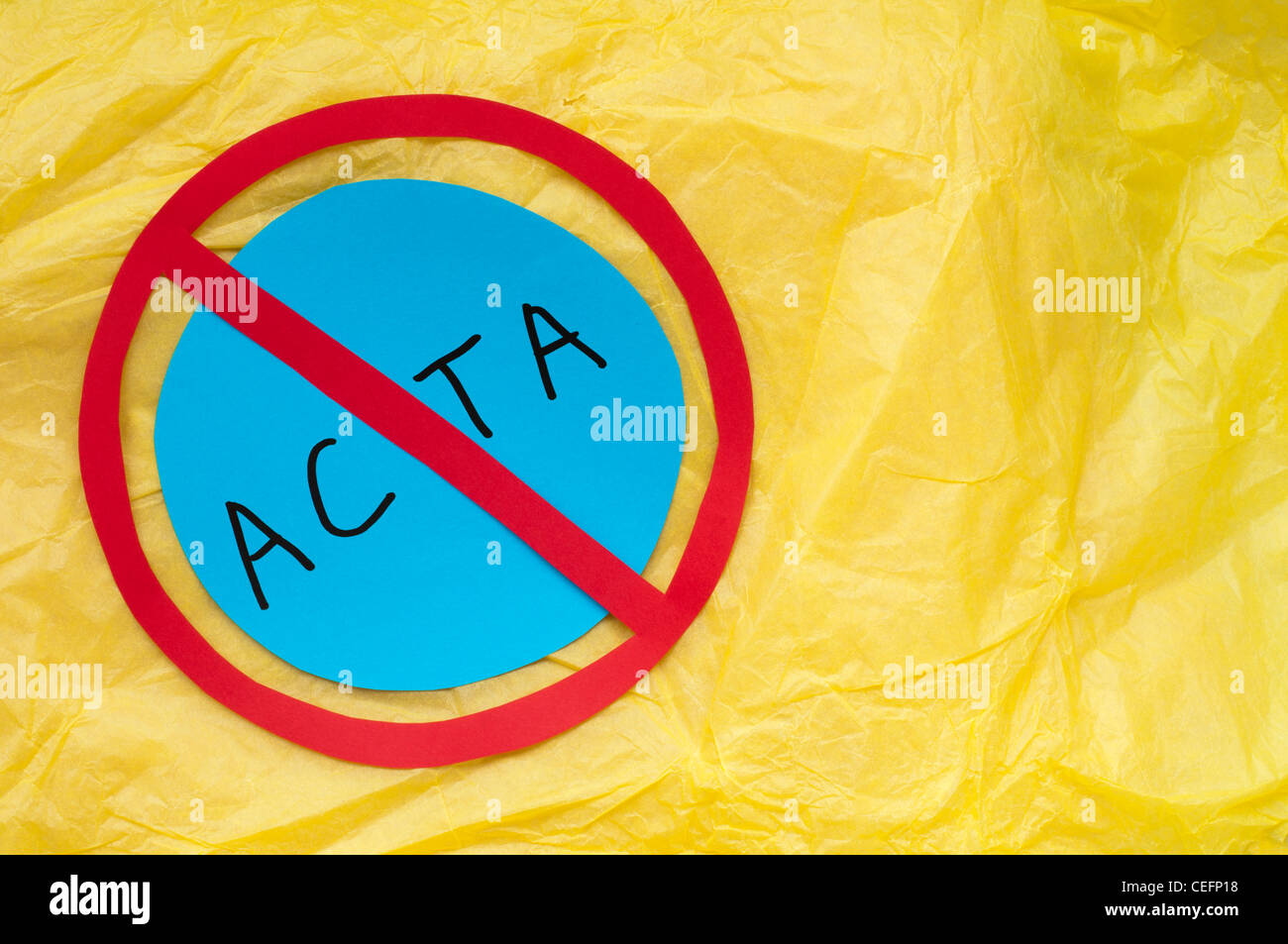 ACTA conception text on yellow paper and prohibition sign. Trade Agreement ACTA about internet Stock Photo