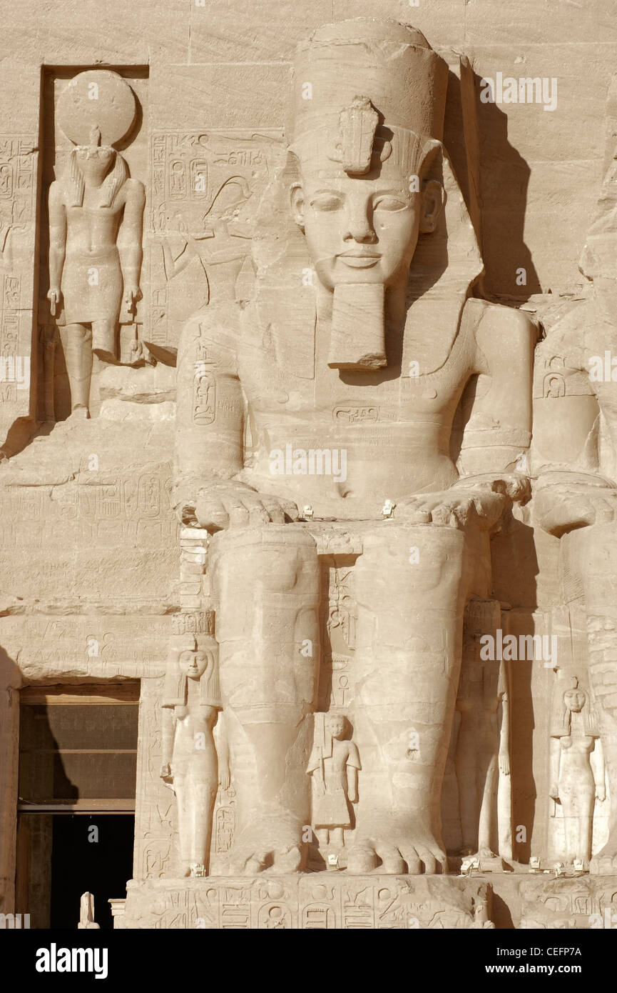 architectural detail of the historic Abu Simbel temples in Egypt (Africa) including a huge stone sculpture of Ramesses 2nd Stock Photo