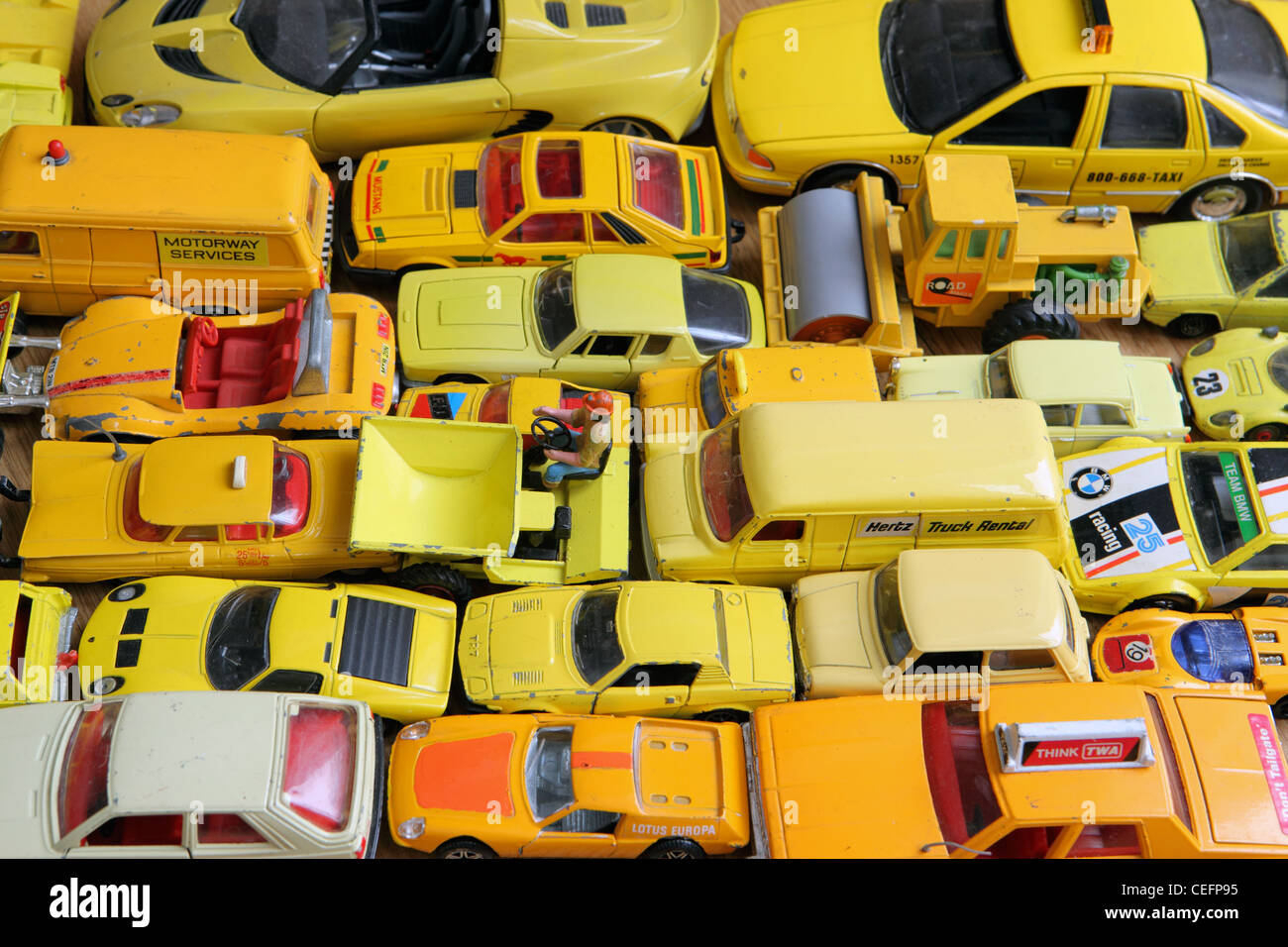 traffic jam of yellow model cars, all different shades of yellow, home studio, UK Stock Photo