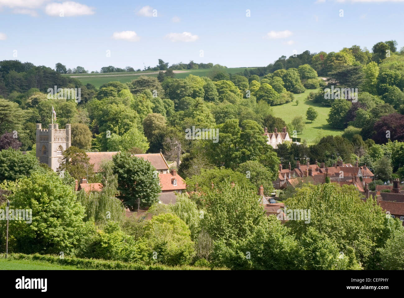 Chiltern Hills view over sunlit Hambleden village Bucks wooded