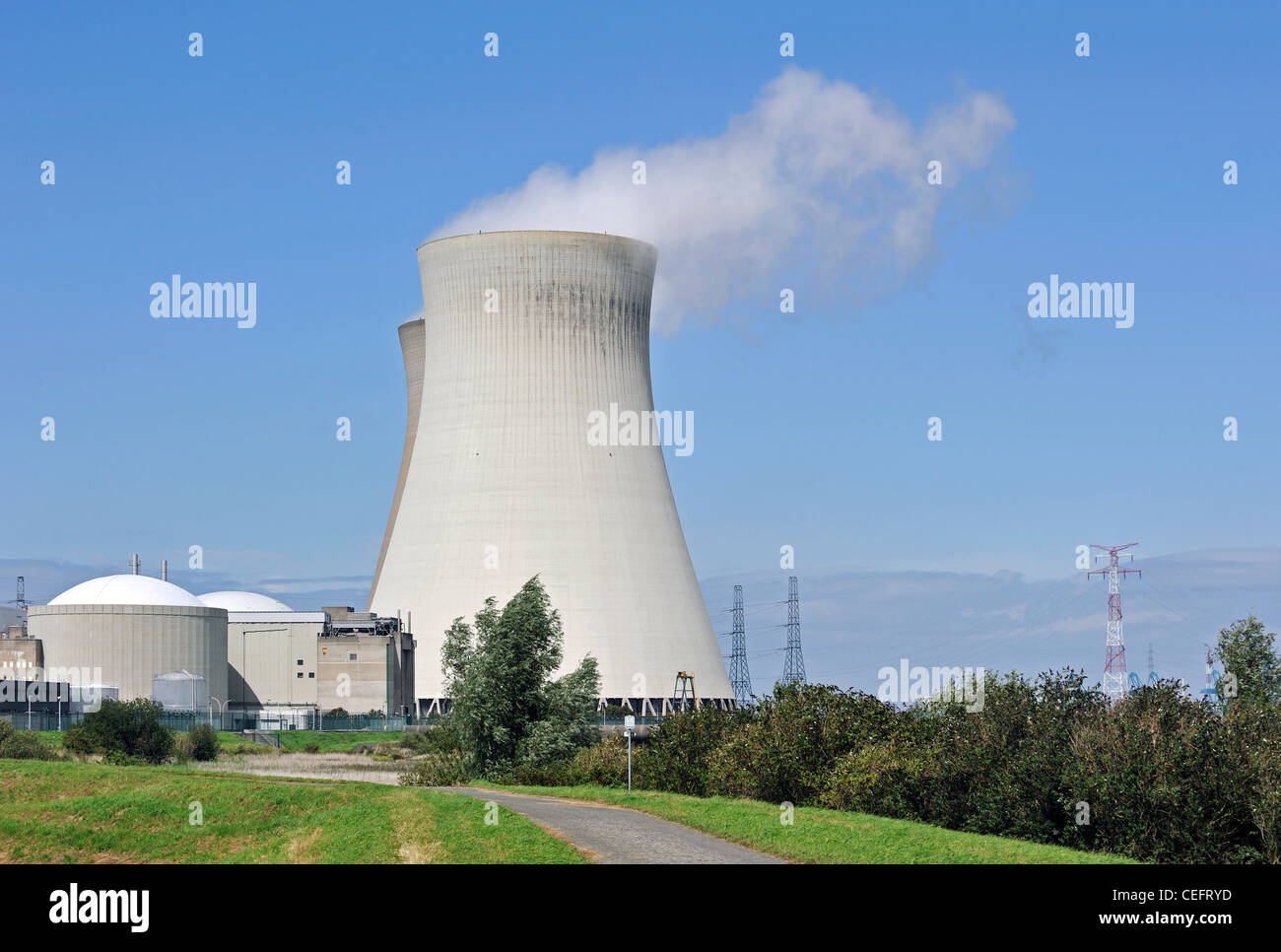 Cooling towers of the Doel Nuclear Power Station along the river Scheldt at Kieldrecht / Beveren, Belgium Stock Photo
