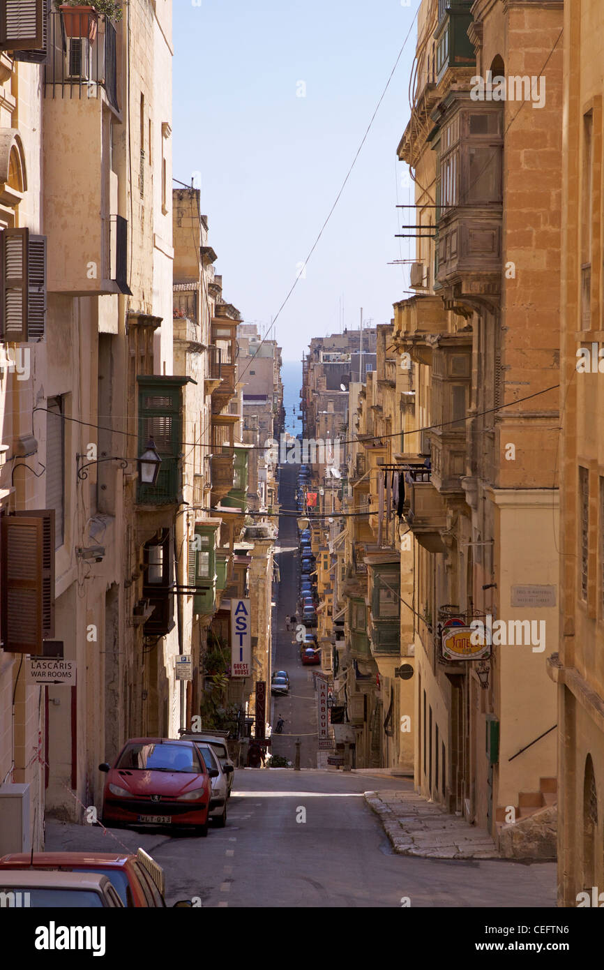 View down St Ursula Street (Triq Sant' Orsla) towards the Mediterranean sea Stock Photo