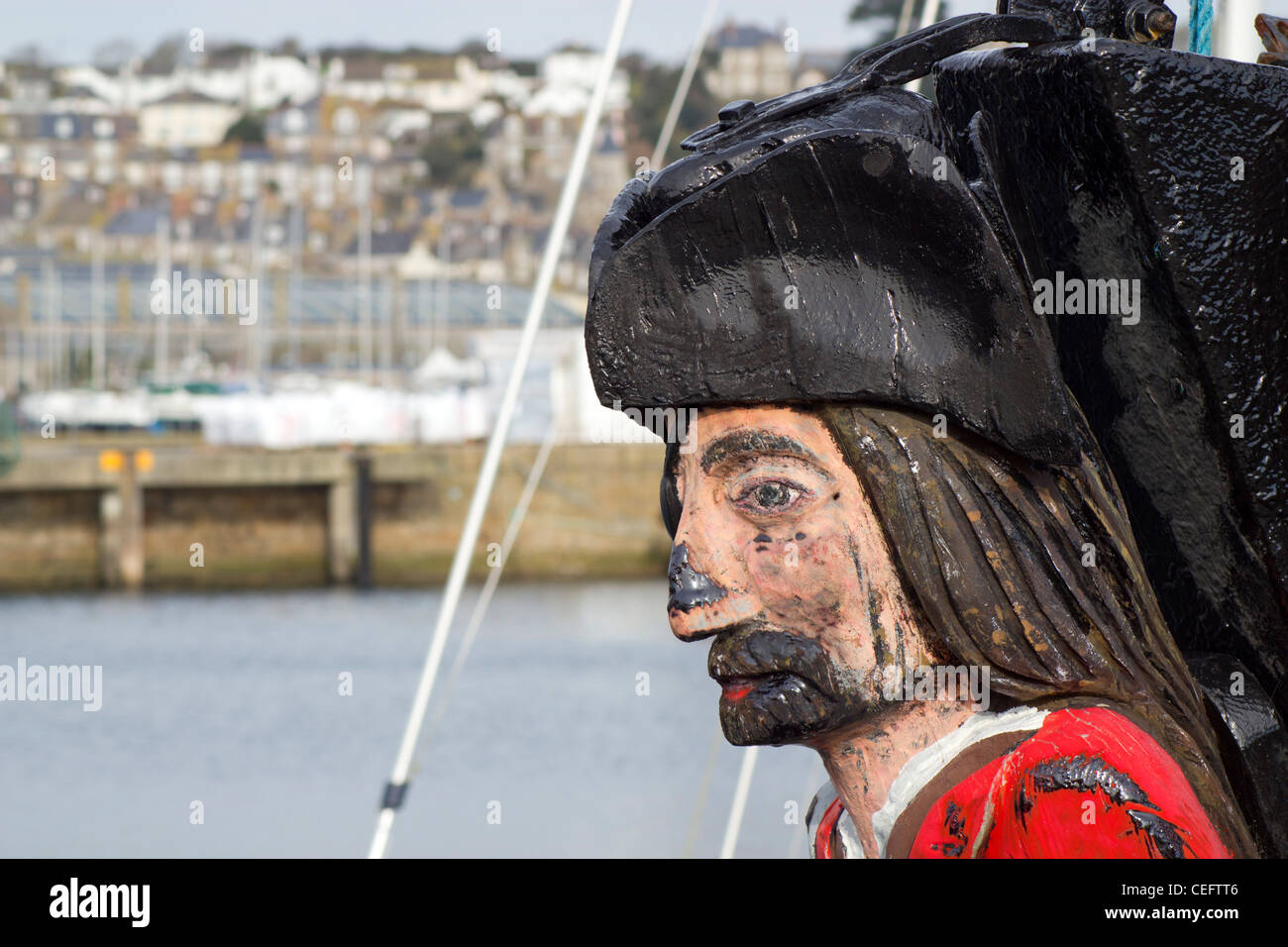 Pirate figurehead on the Bag O' Rags Pirate shop boat in Penzance harbour, Cornwall UK. Stock Photo