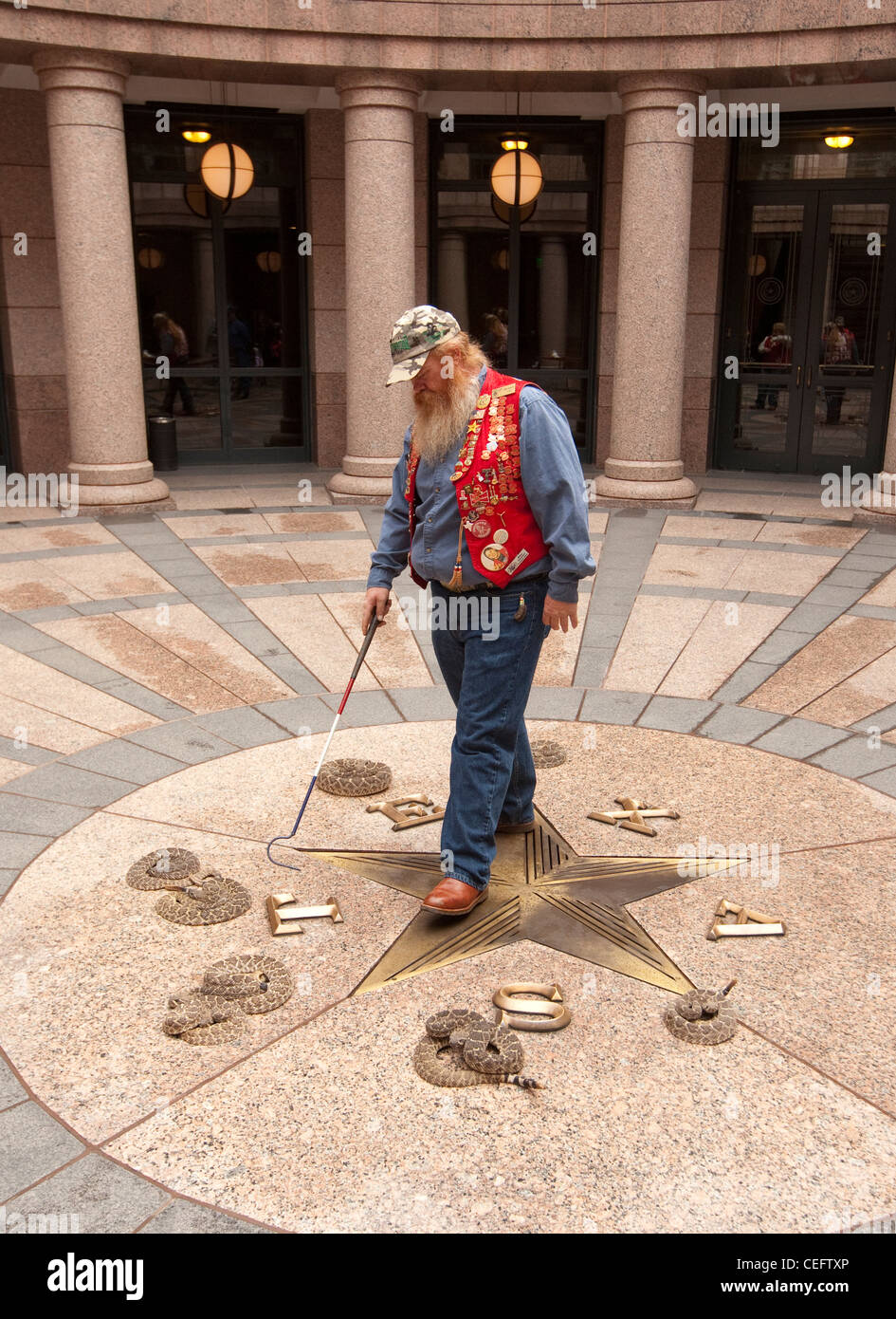 Snake handler  Riley Sawyers during a visit to the Texas Capitol to promote a rattlesnake roundup event Stock Photo