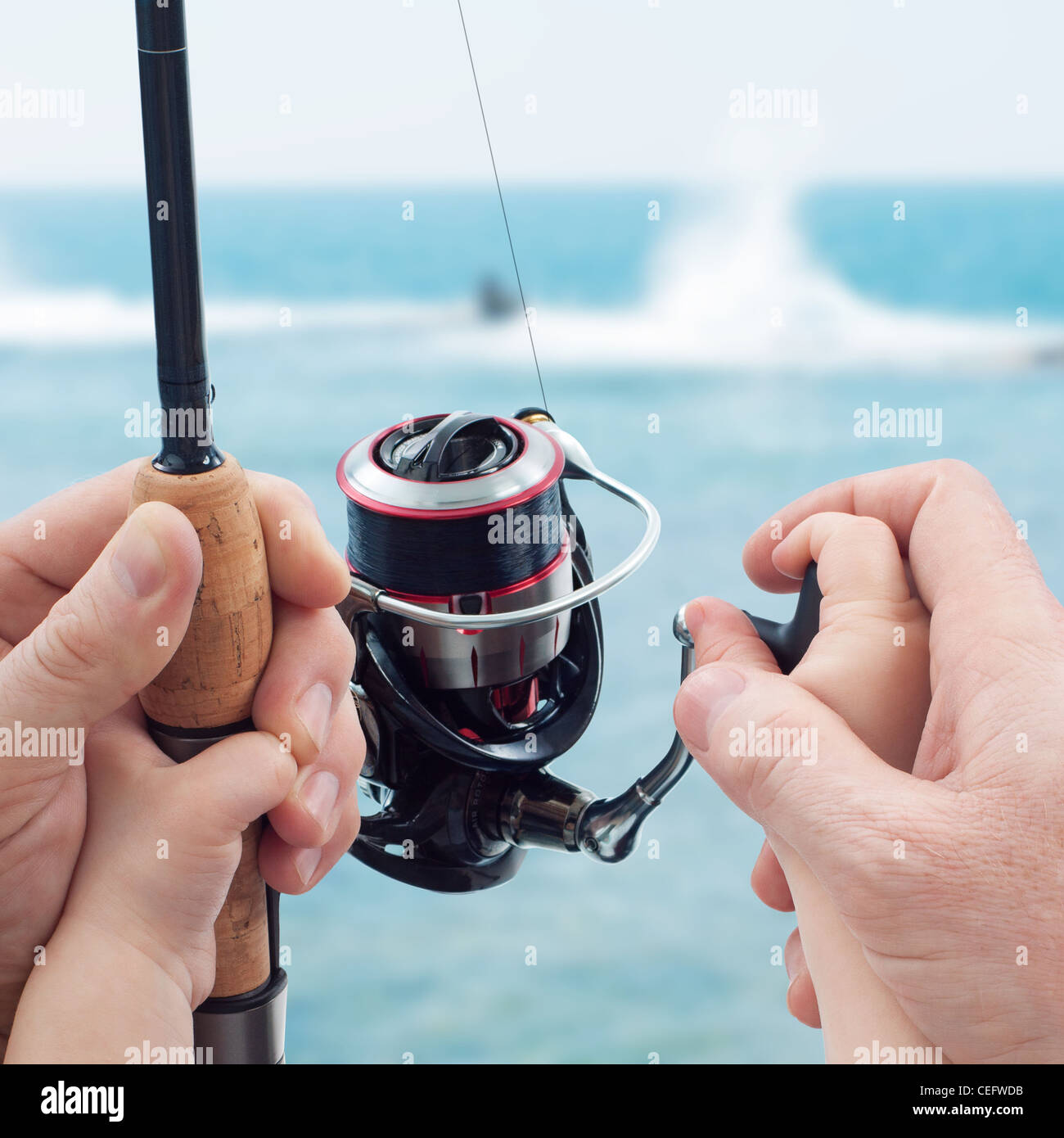 Father teaching his child to fishing on. Fishing family day Stock Photo