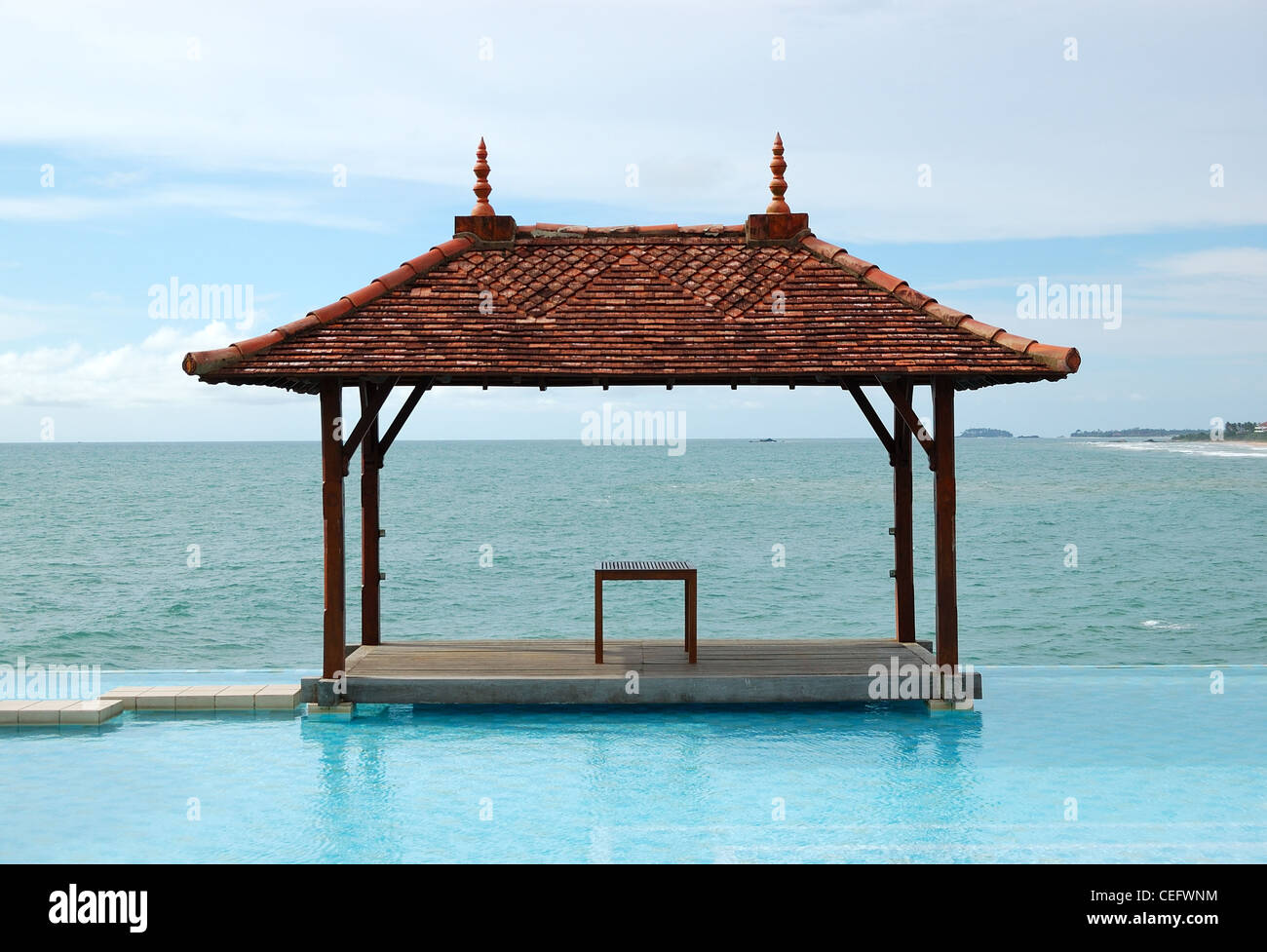 Traditional style hut at the sea view swimming pool, Bentota, Sri Lanka Stock Photo
