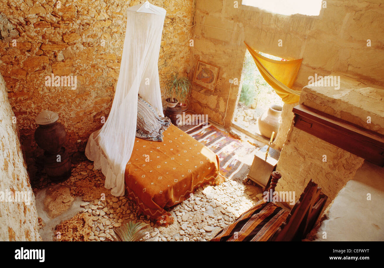 Birdseye View Of Rough Walls In Rustic Majorcan Bedroom With