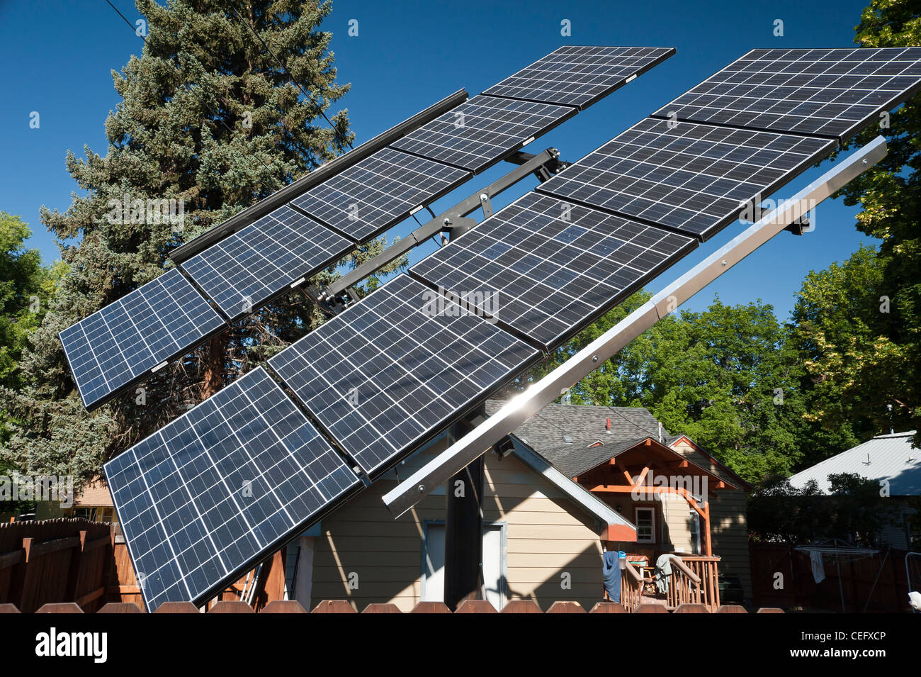 Solar panels that rotate with the sun in a Hamilton, Montana backyard Stock  Photo - Alamy