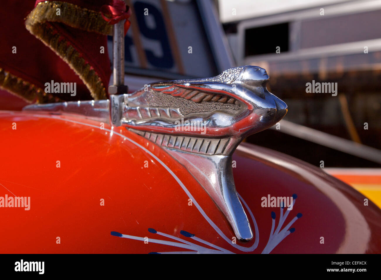 Silver Lady 'hood ornament' on a 1950's Fordson Thames ET7 bus, at the bus terminus in Valletta Stock Photo