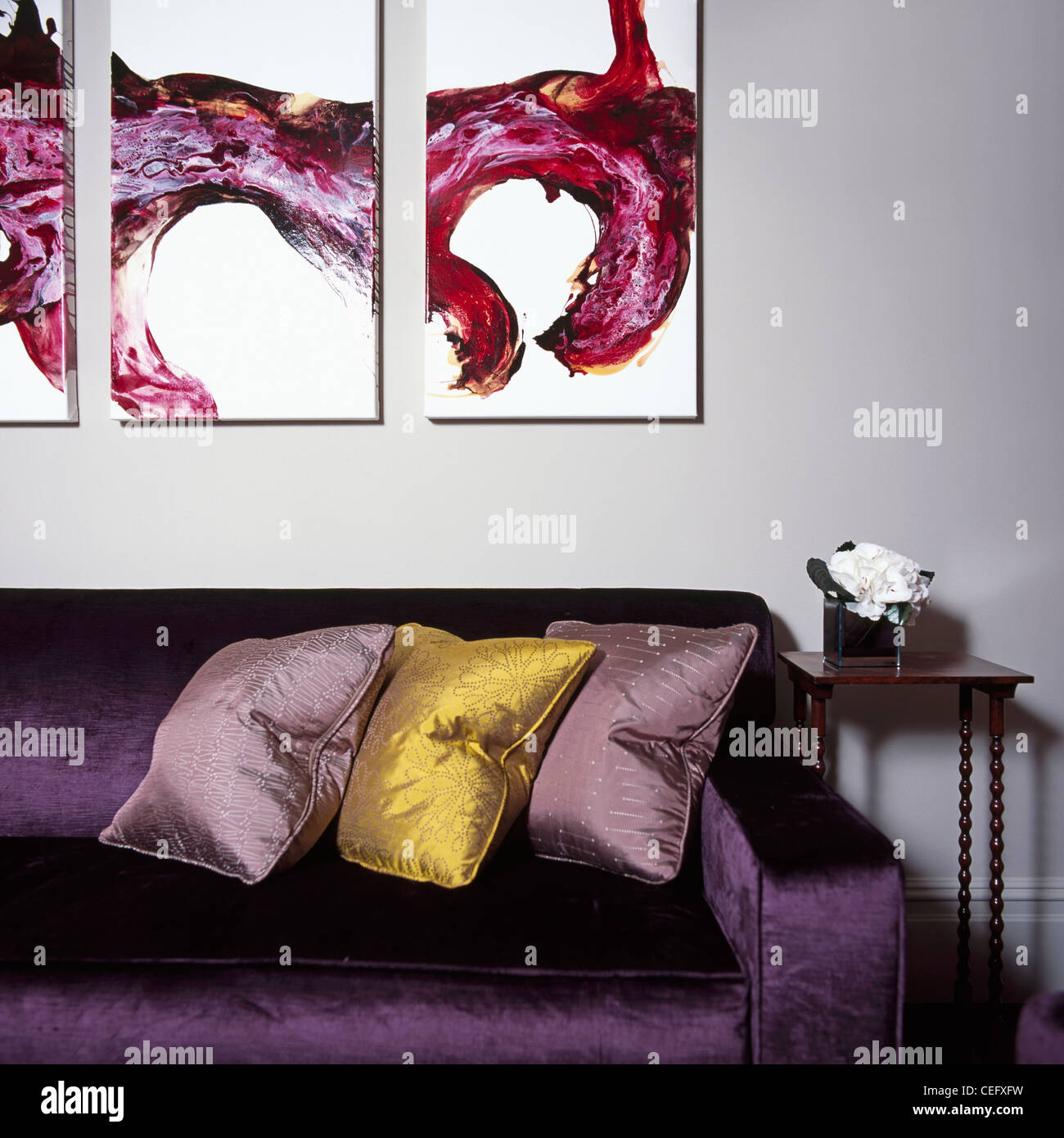 Purple And Gold Silk Cushions On Purple Silk Sofa Below Modern Stock Photo Alamy