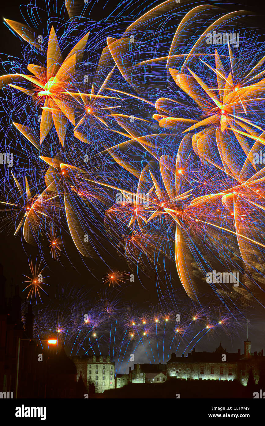 Spectacular fireworks over Edinburgh Castle, Scotland celebrating Hogmanay (that is New Year) Stock Photo