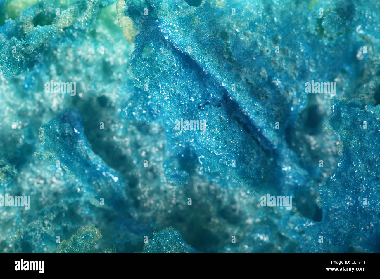 Green abrasive sponge texture background blue Stock Photo Alamy