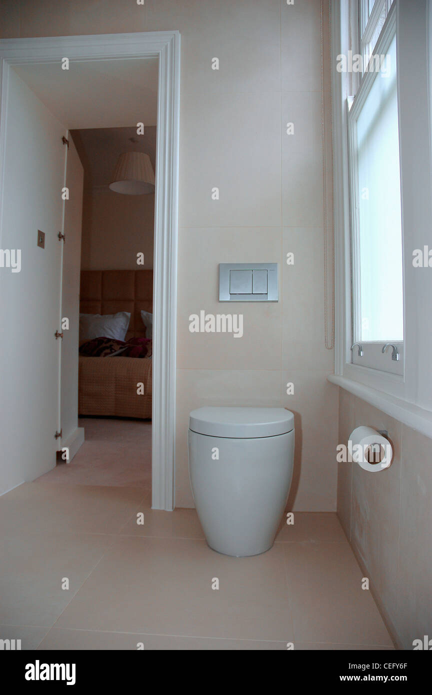 Philippe Starck toilet in modern cream bathroom Stock Photo