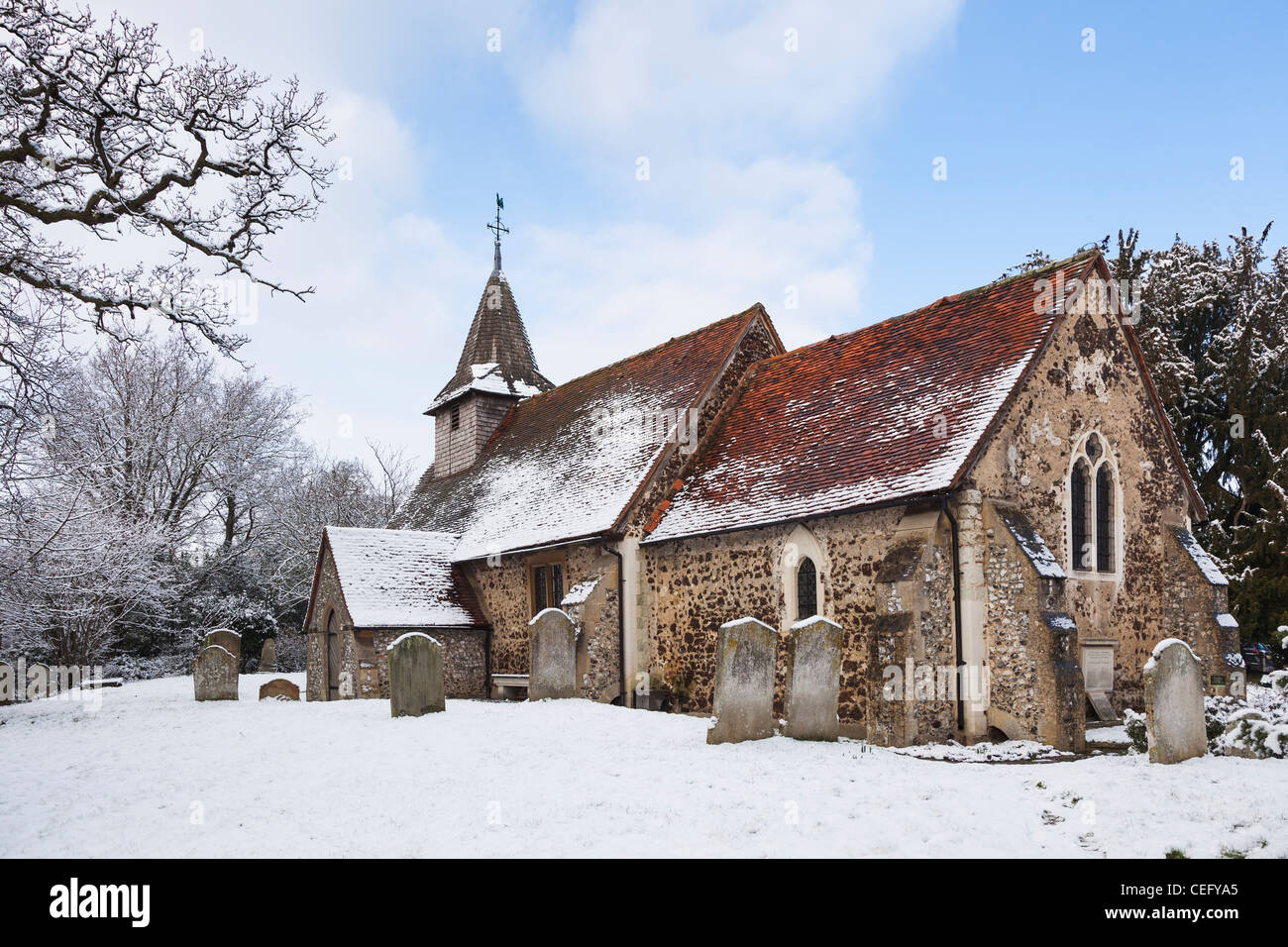 St Nicholas' Church, Church Hill, Pyrford, Surrey, England with grave