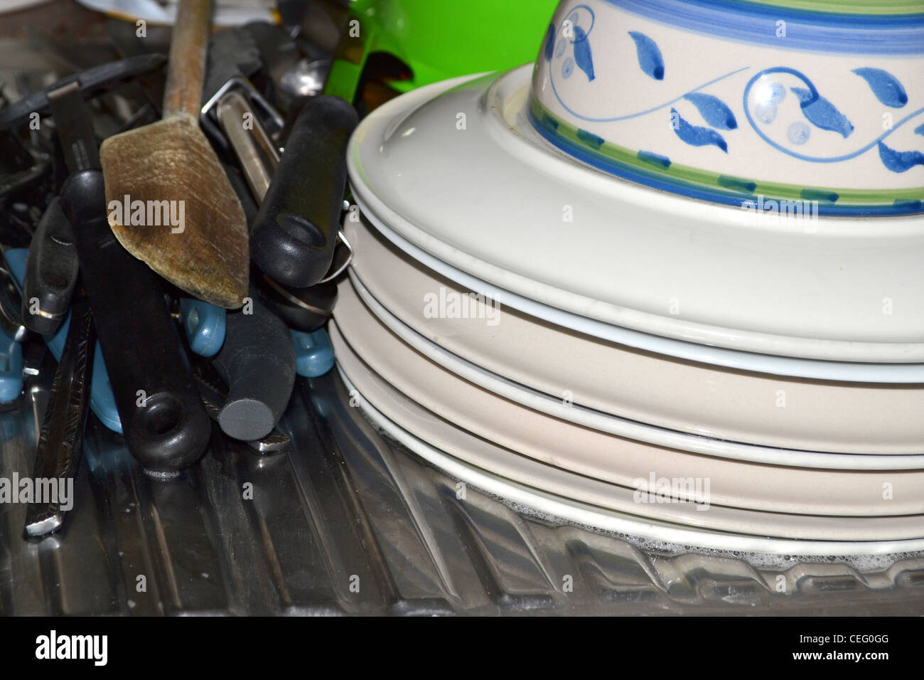 clean stack of dishes and cutlery Stock Photo