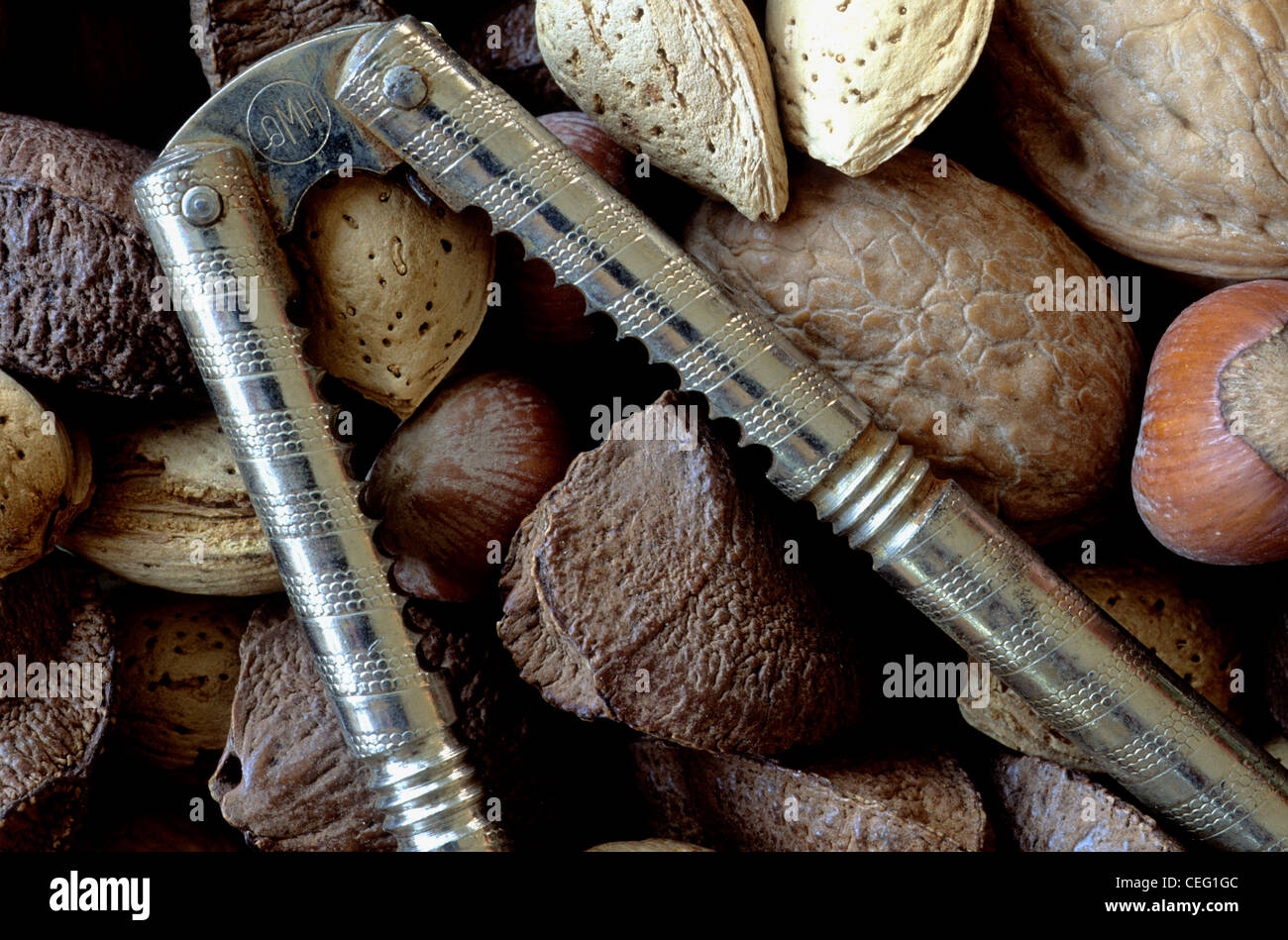 nutcracker with mixed nuts Stock Photo Alamy