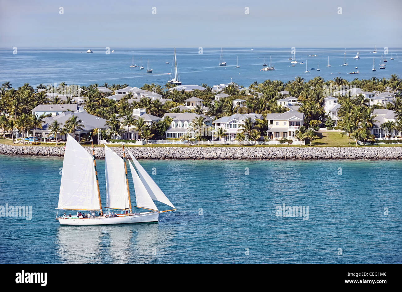 A sail boat next to Sunset Island in Key West, Florida Stock Photo
