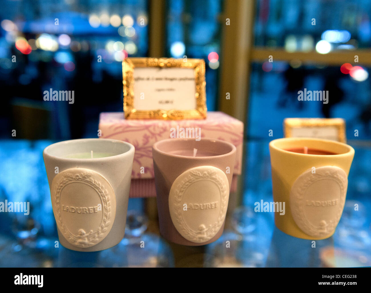 Ladurée, one of Paris' most expensive bakery shops, also produces room  perfumes and candles Stock Photo - Alamy