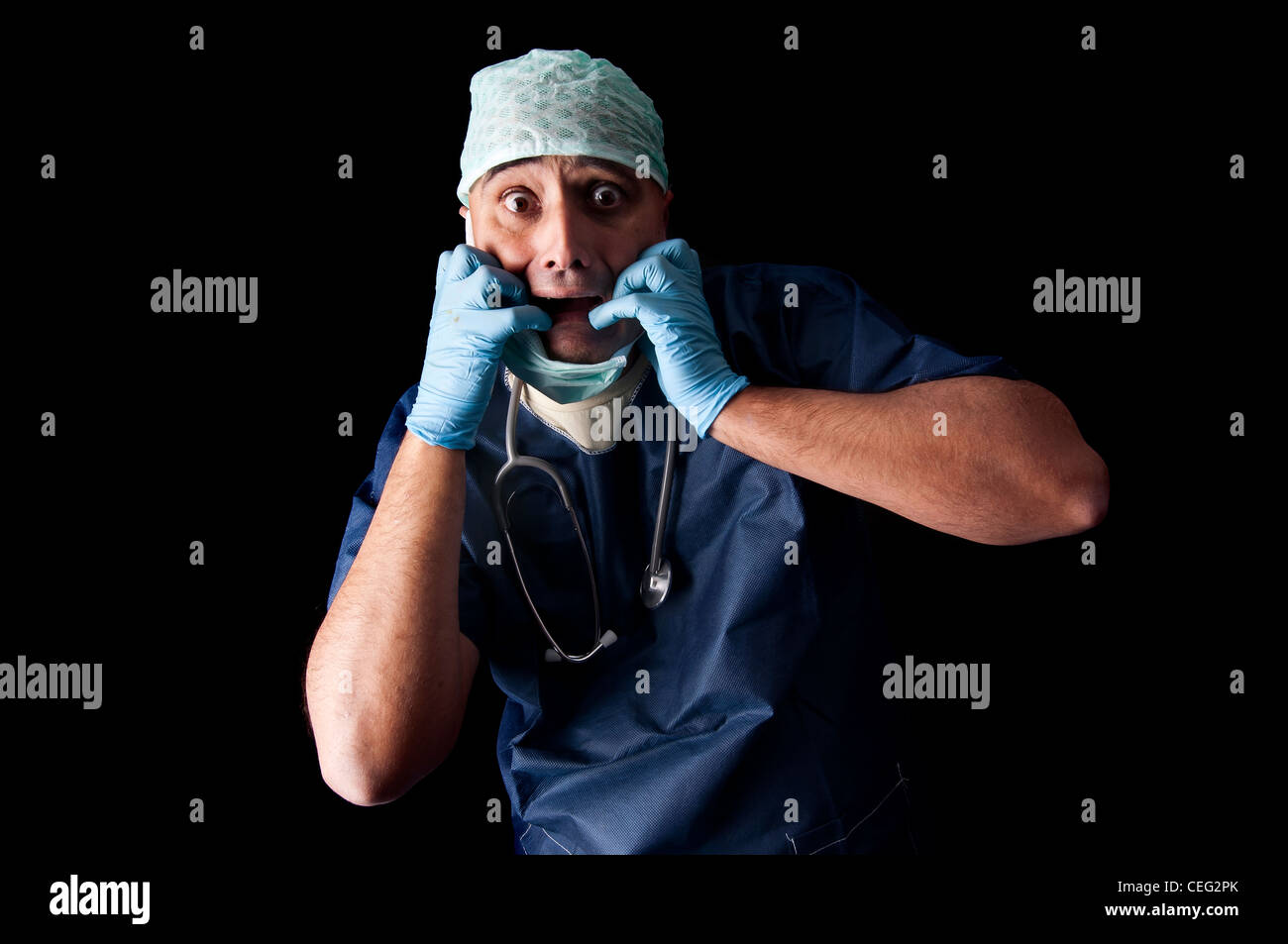 Stressed doctor in a dark background Stock Photo - Alamy