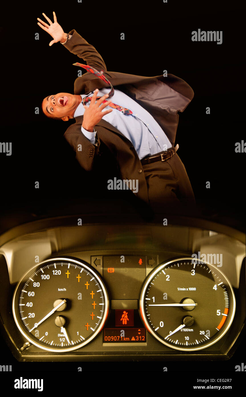 man being run over by a speeding car Stock Photo