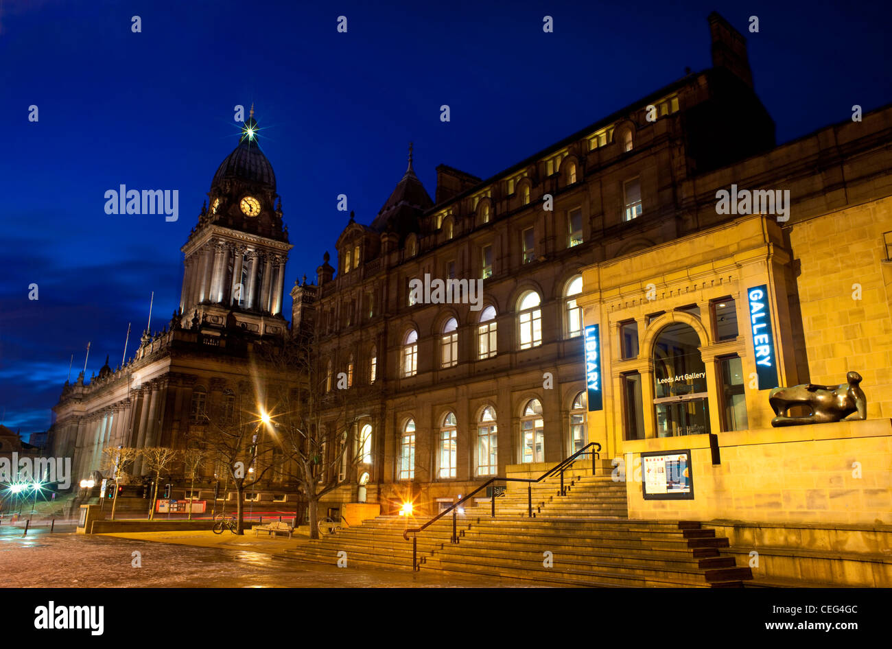 leeds town hall and the City art gallery at twilight with reclining figure sculpted by Sir Henry Moore leeds yorkshire uk Stock Photo