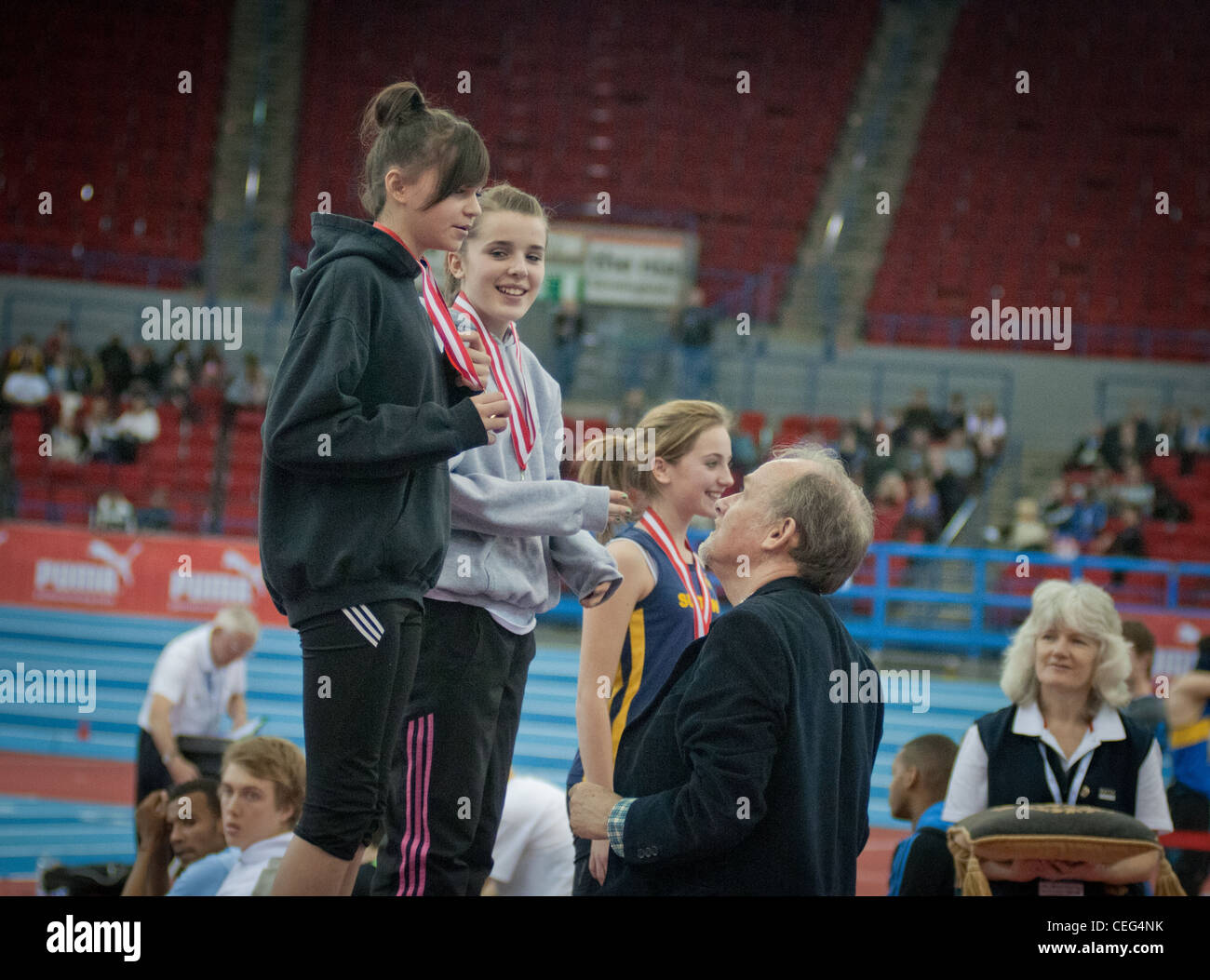 Girls receiving athletic awards Stock Photo