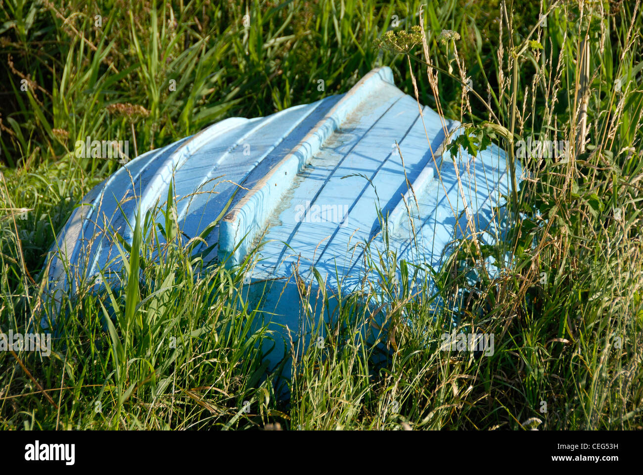 Boat Dinghy Upside Down High Resolution Stock Photography and Images