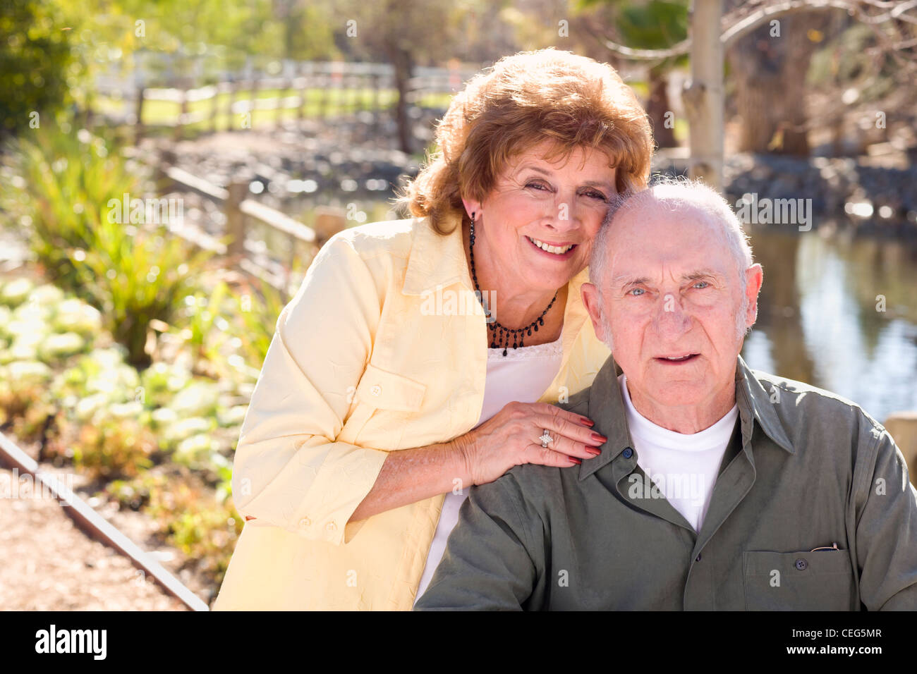 Happy Senior Couple Enjoying Each Other in The Park Stock Photo - Alamy