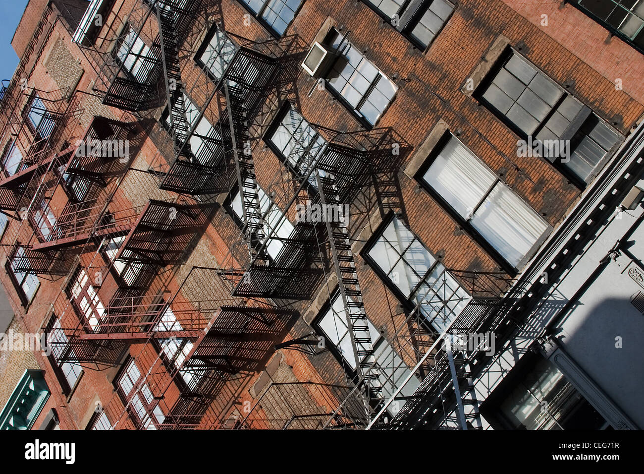 Buildings with fire exit ladders in Soho. New York City Stock Photo