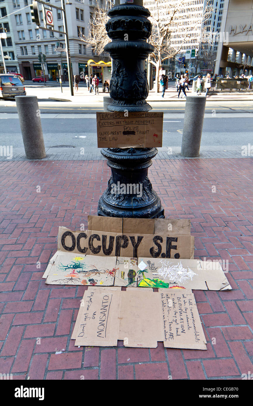 Slogans and messages of protest written and painted on corrugated cardboard  torn from cartons, on the streets of San Francisco. Stock Photo