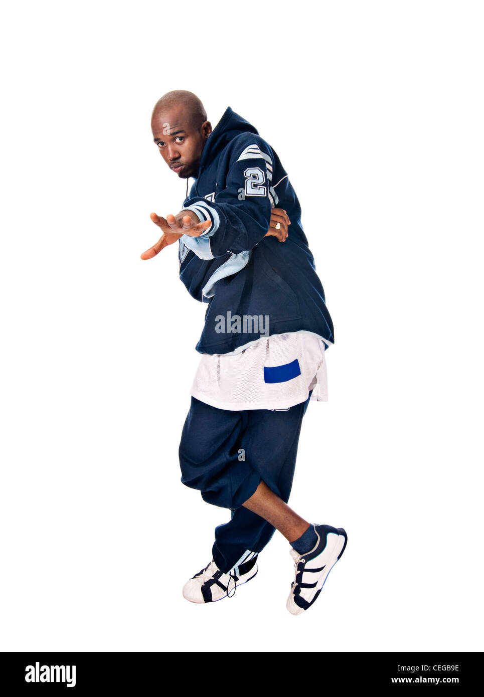Cool young hip-hop dancer on white background Stock Photo - Alamy