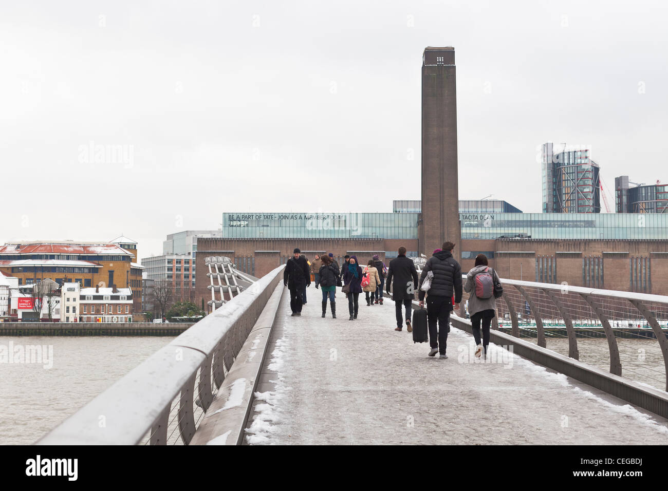 The Millennium bridge with snow, London, England Stock Photo