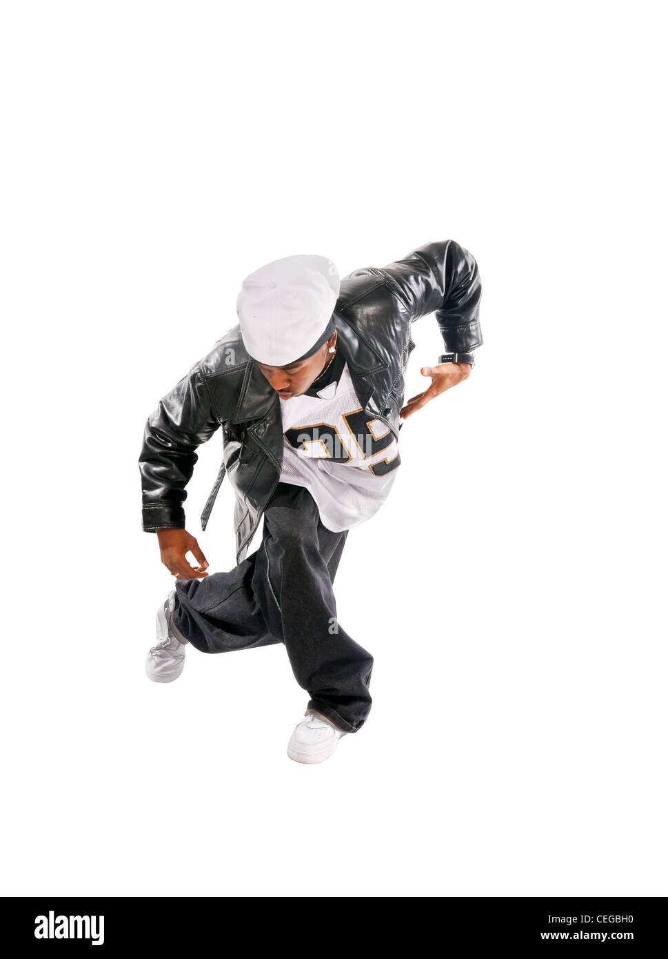 Cool young hip-hop dancer on white background Stock Photo - Alamy