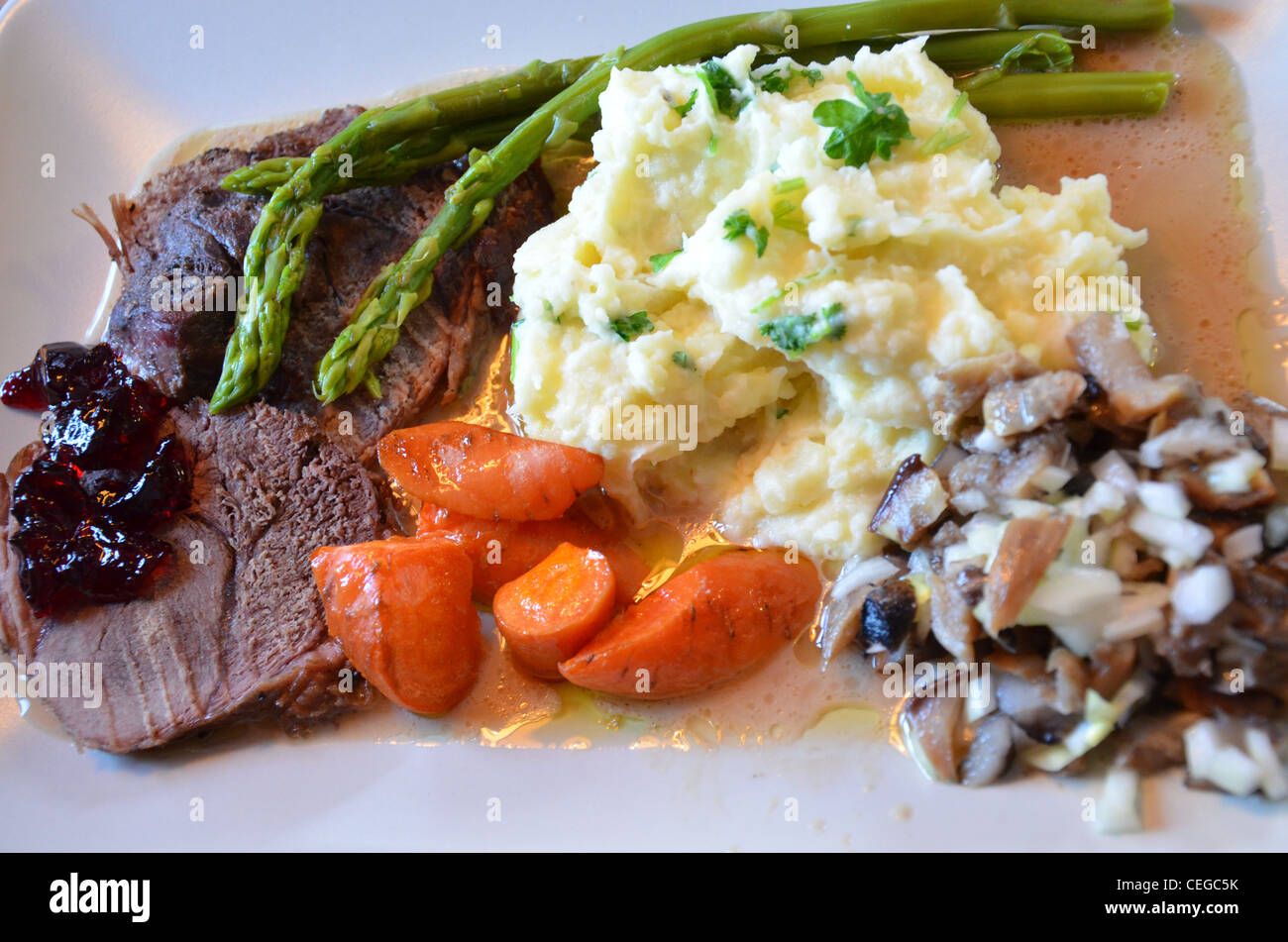 Dish with meat of wild boar and vegetables Stock Photo
