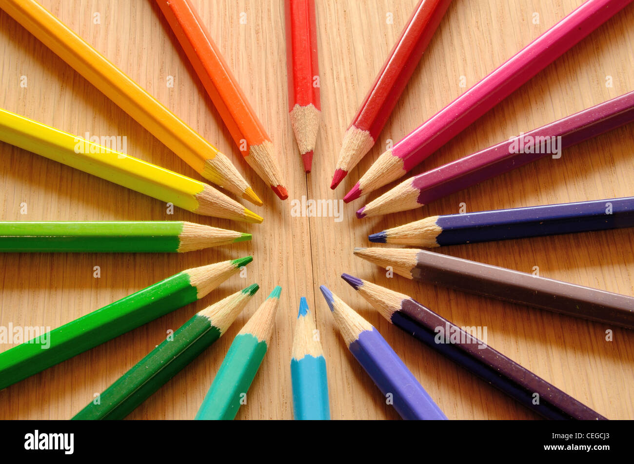 Beautiful colored pencils on a wood texture Stock Photo Alamy