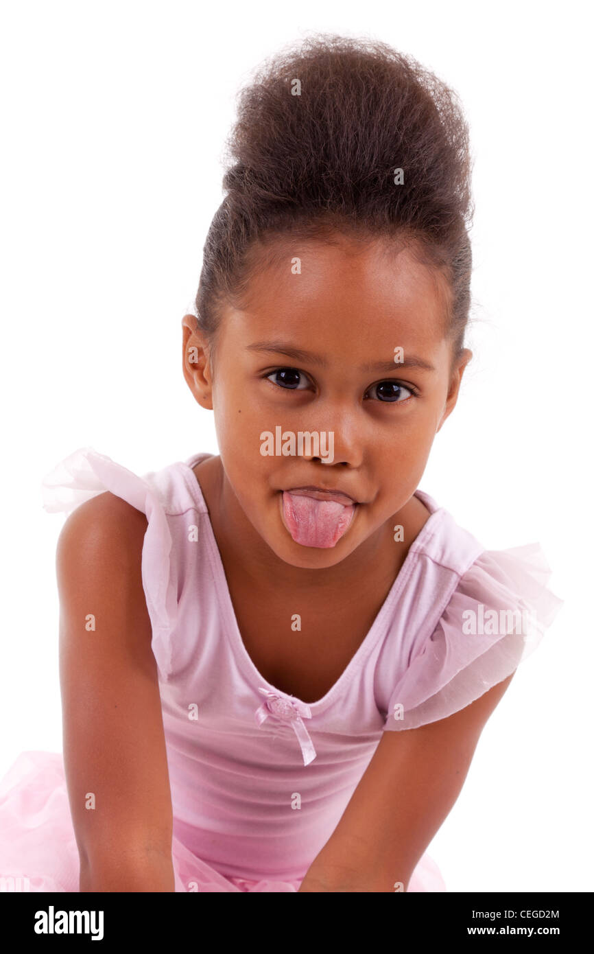 Lil girl tongue Cute little African Asian girl sticking tongue out, isolated on white  background Stock Photo - Alamy